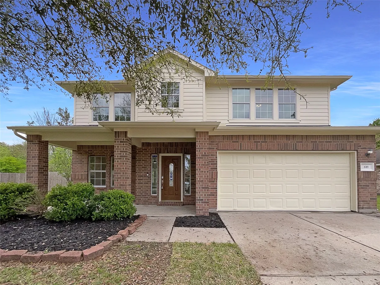 The Woodlands Real Estate | View 611 Timberstand Lane | 4 Beds, 2 Baths