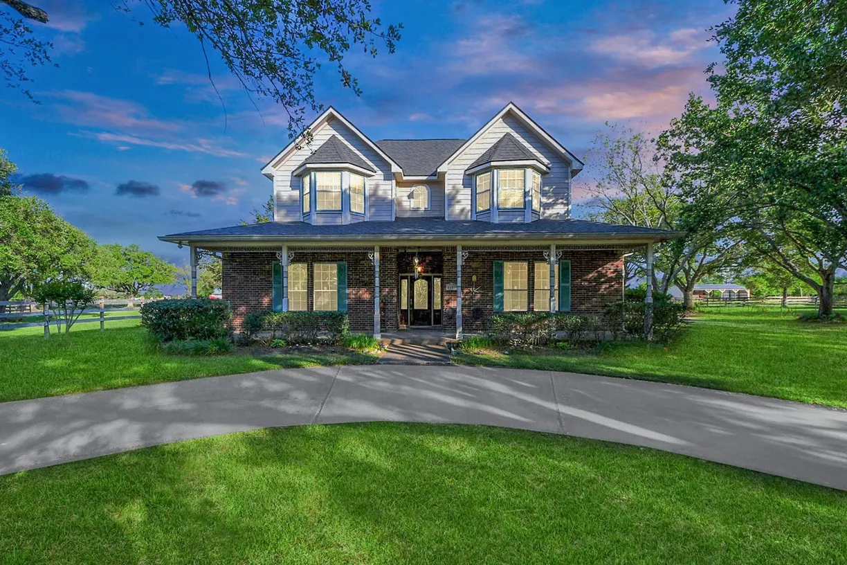 Houston Suburbs Real Estate | View 5607 Philip Evan Road | 4 Beds, 2 Baths