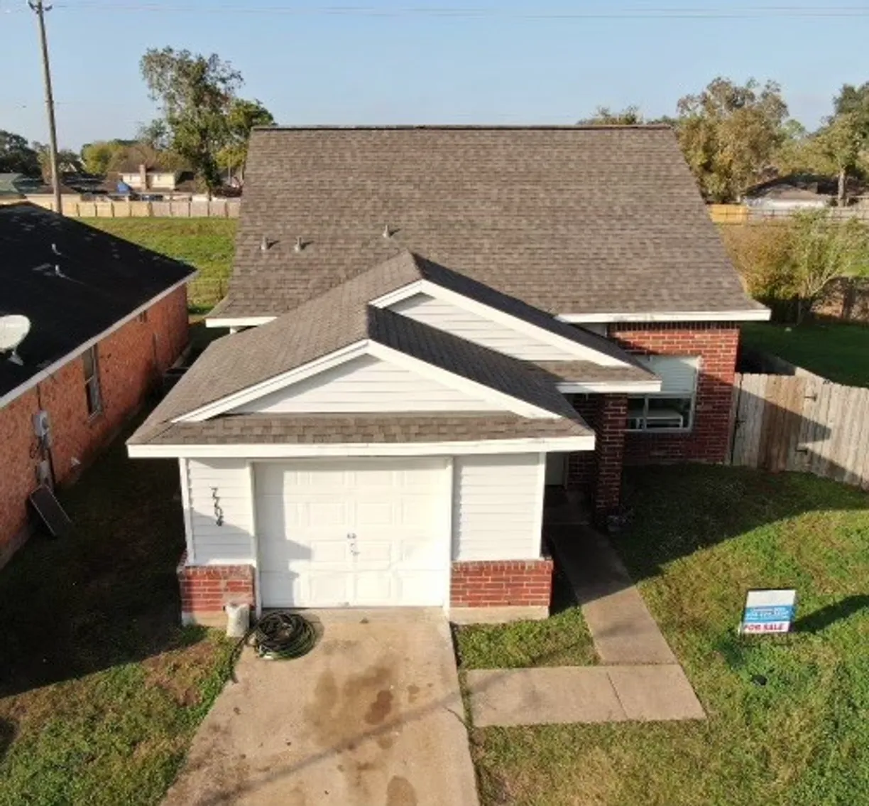Houston Suburbs Real Estate | View 7704 Sign Street | 4 Beds, 2 Baths