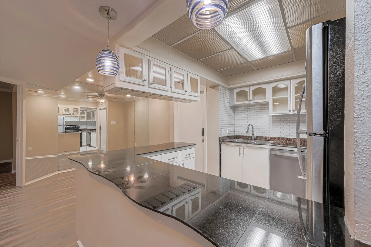 Houston Real Estate | View 3045 Walnut Bend Lane, 11 | 2 Beds, 2 Baths