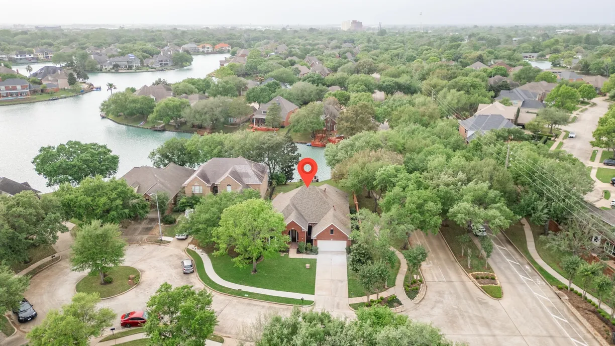 Houston Suburbs Real Estate | View 415 Sheldrake Court | 4 Beds, 2 Baths