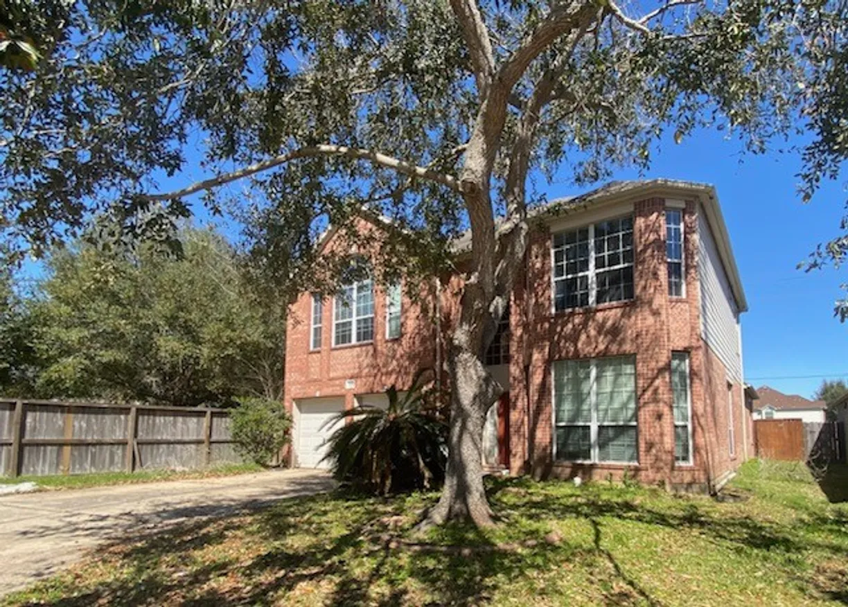 Houston Suburbs Real Estate | View 3103 Travis Creek Way | 4 Beds, 3 Baths