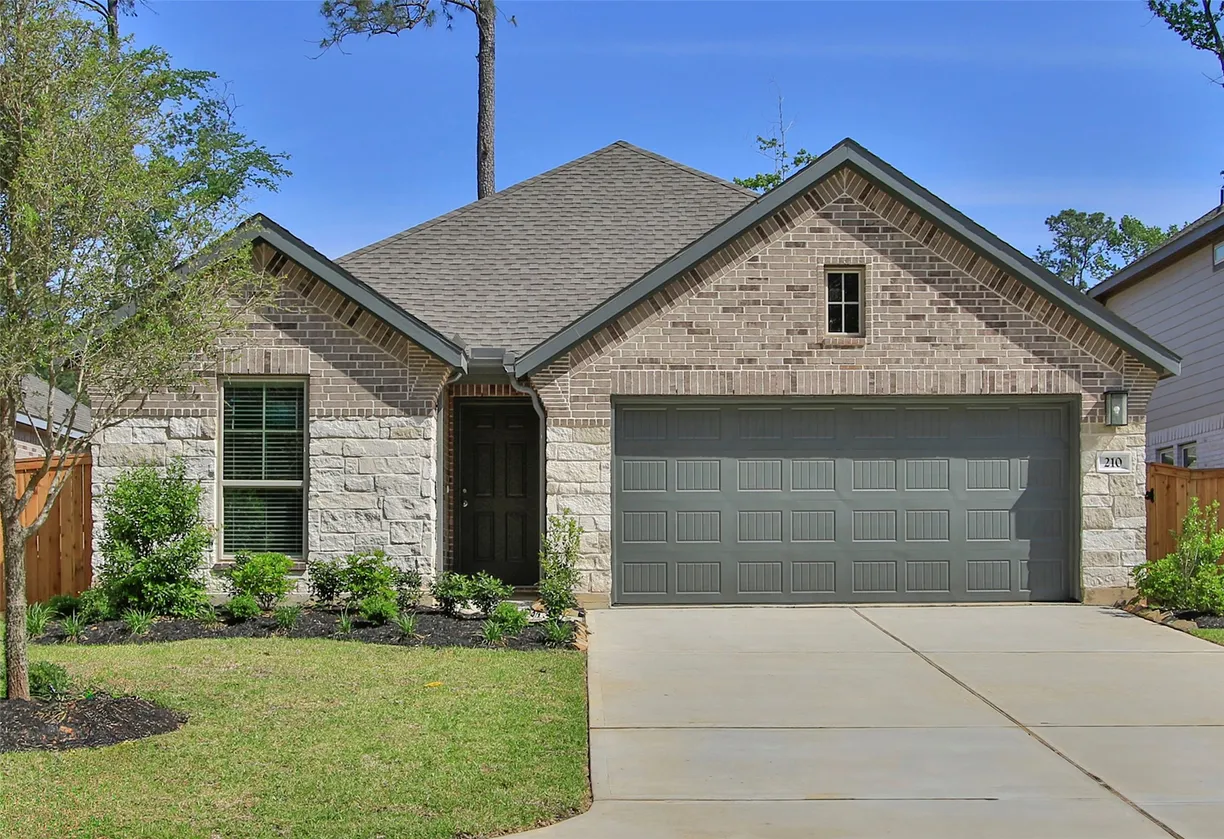 Houston Real Estate | View 210 Brecon Buff Drive | 4 Beds, 3 Baths