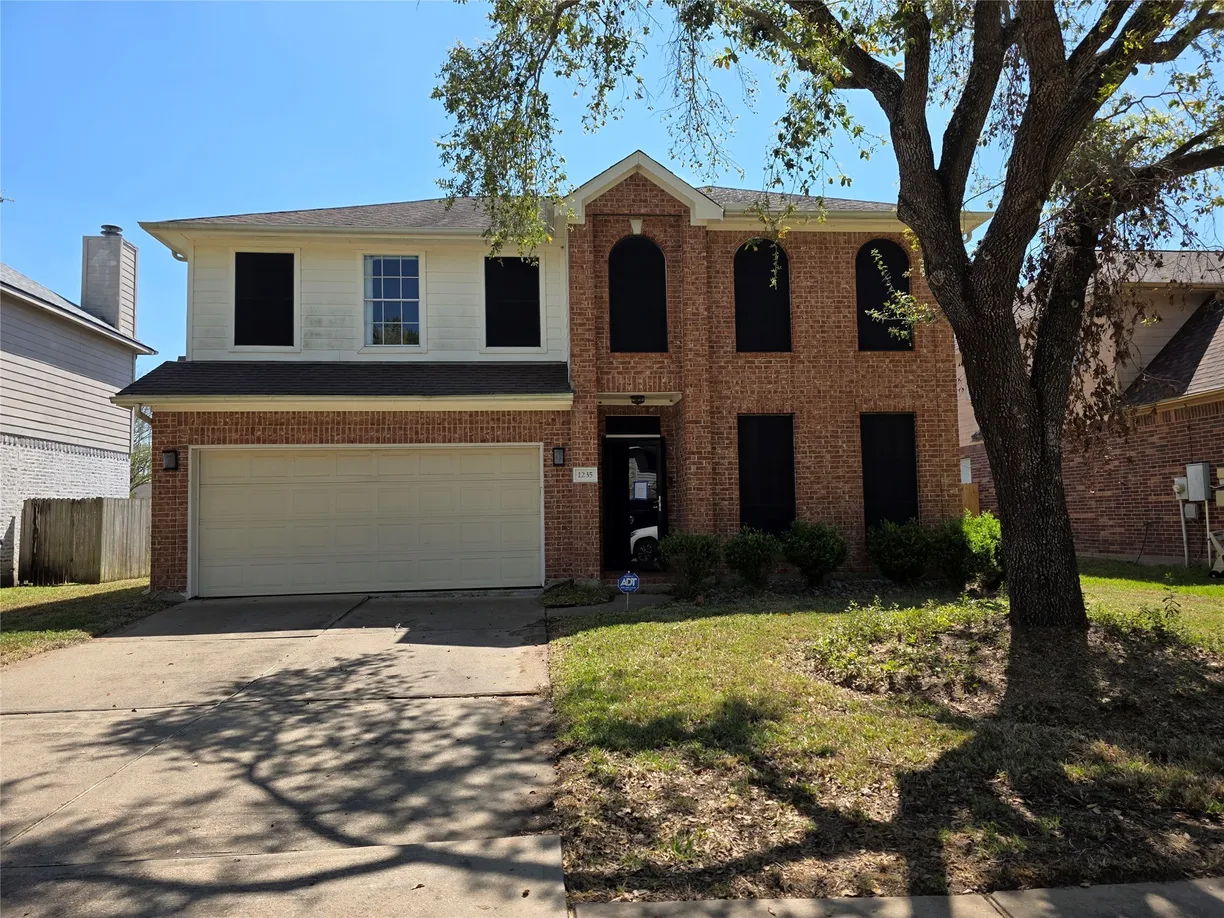 Houston Suburbs Real Estate | View 1235 N Arbor Bough Circle | 4 Beds, 2 Baths