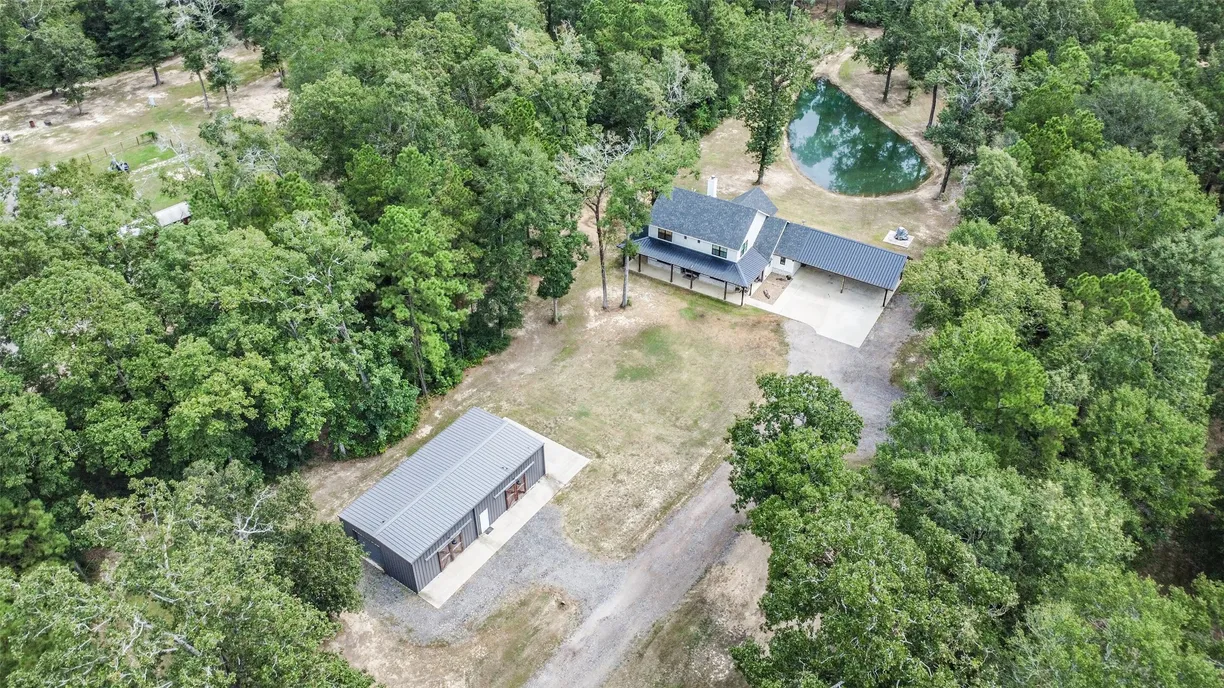 Houston Suburbs Real Estate | View 410 County Road 2254 | 4 Beds, 2 Baths