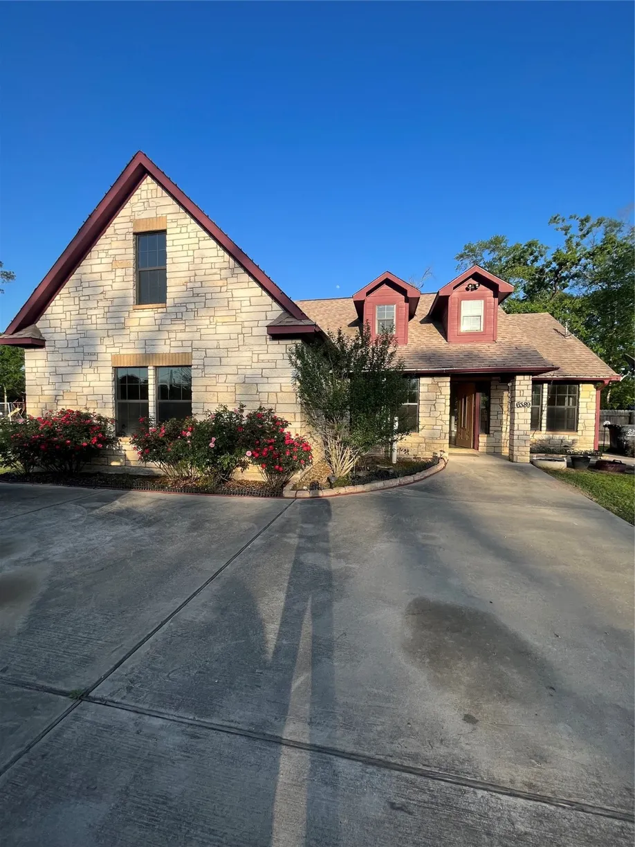 The Woodlands Real Estate | View 6389 Waukegan Road | 5 Beds, 3 Baths