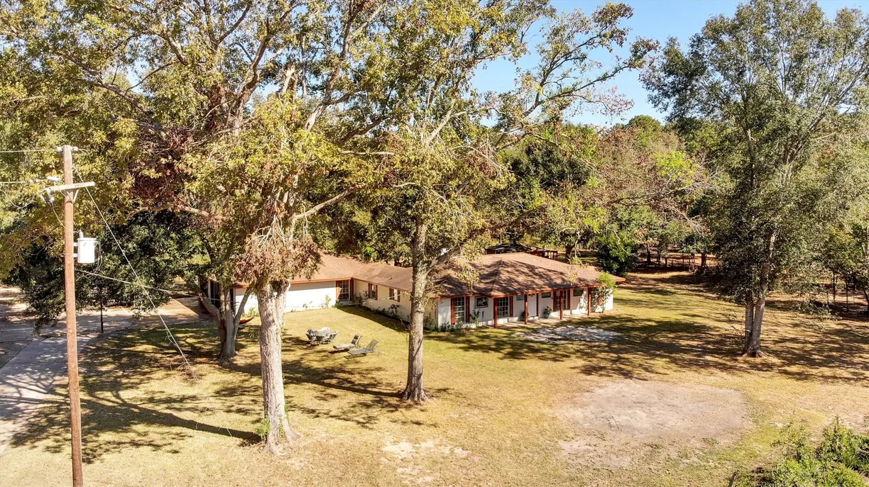 Houston Suburbs Real Estate | View 564 County Road 347 | 4 Beds, 3 Baths