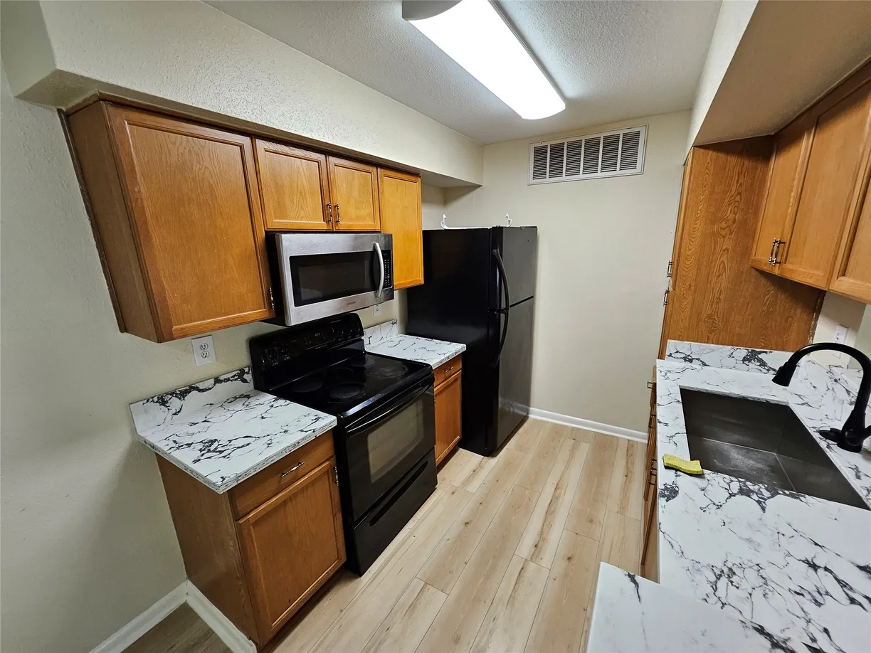 Houston Real Estate | View 12955 Woodforest Boulevard, 77 | Listing
