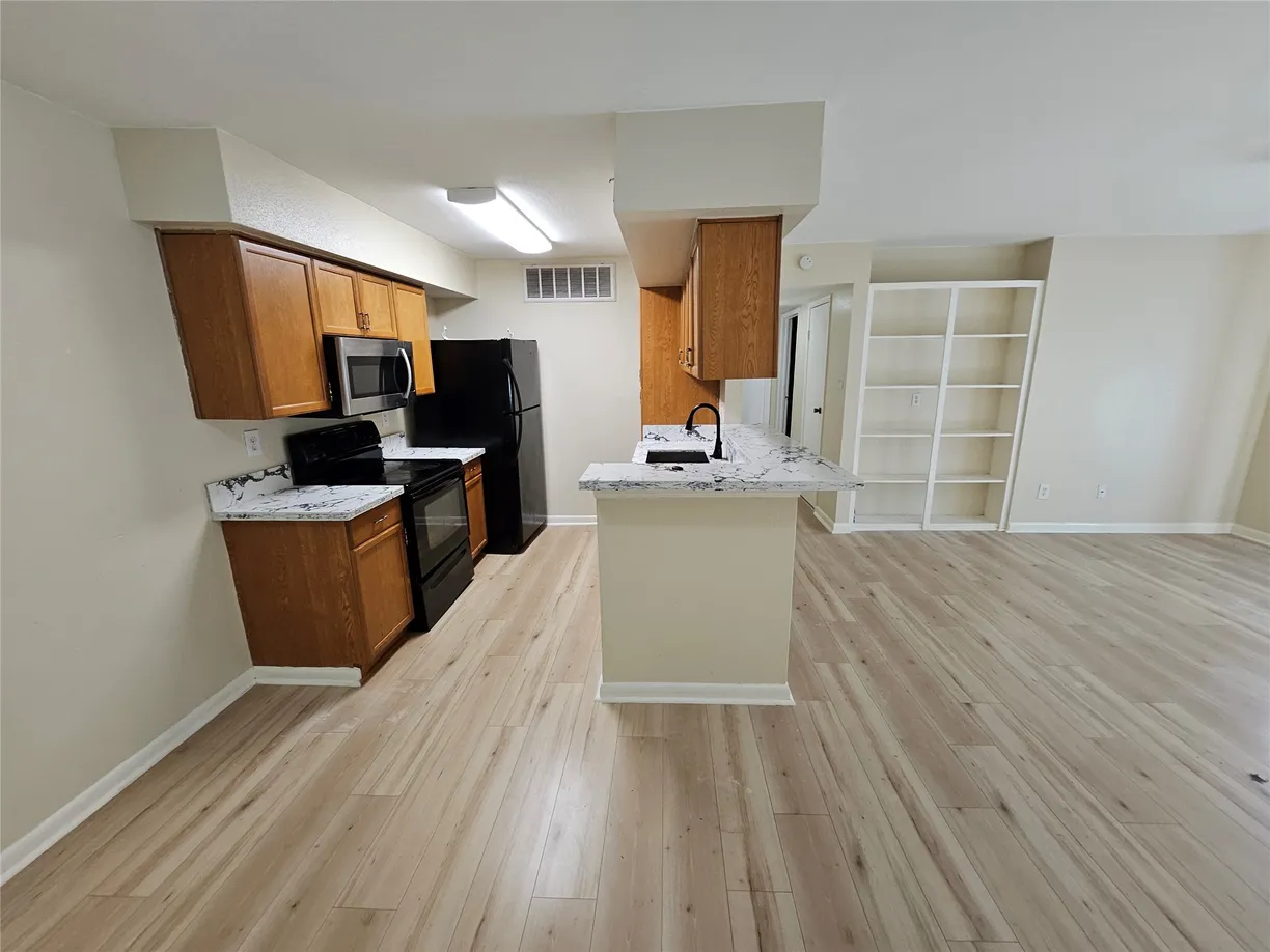 Houston Real Estate | View 12955 Woodforest Boulevard, 77 | Listing
