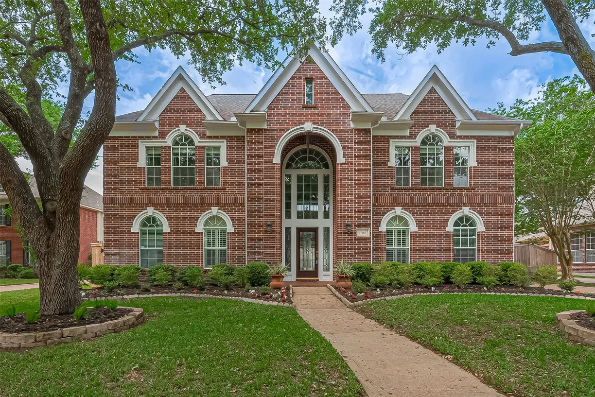 Houston Suburbs Real Estate | View 17110 Rolling Brook Court | 4 Beds, 3 Baths