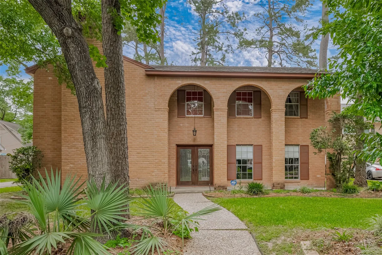 Houston Real Estate | View 11814 Cypresswood Drive | 4 Beds, 2 Baths