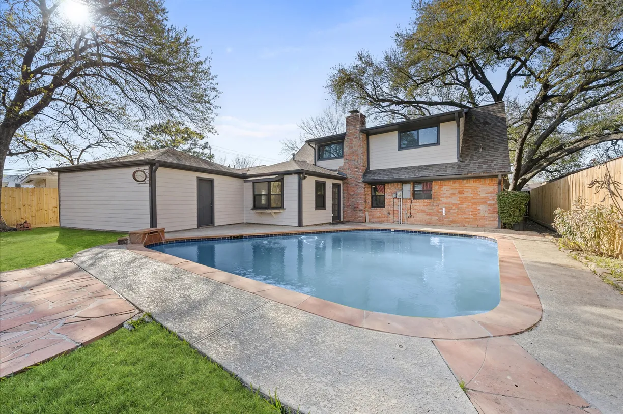 The Woodlands Real Estate | View 4827 Elmbrook Drive | 4 Beds, 2 Baths