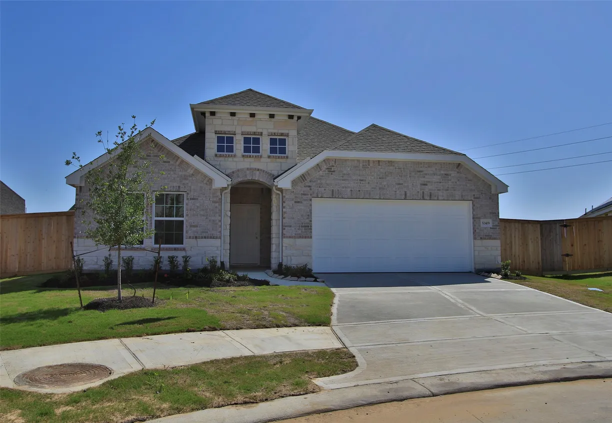 Houston Suburbs Real Estate | View 32419 Tallow Creek Drive | 4 Beds, 2 Baths