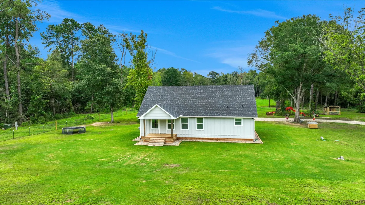 Houston Suburbs Real Estate | View 840 County Road 2224 | 2 Beds, 2 Baths
