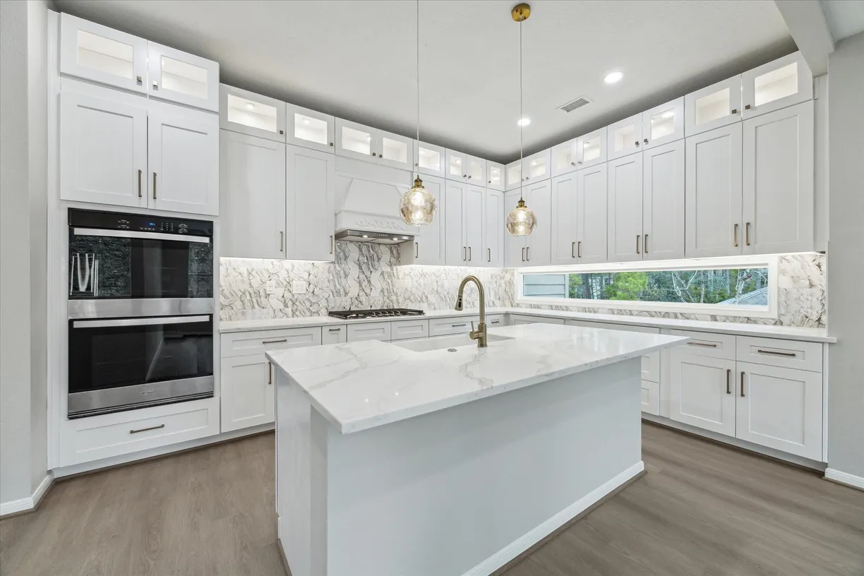 The Woodlands Real Estate | View 27 Larks Aire Place | 4 Beds, 2 Baths