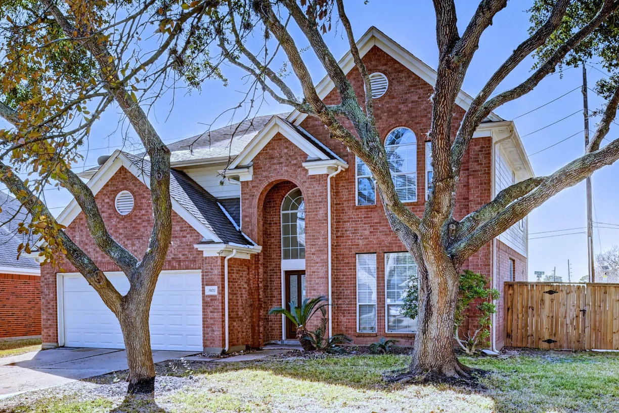 Houston Suburbs Real Estate | View 7402 Broken Oak Lane | 4 Beds, 2 Baths