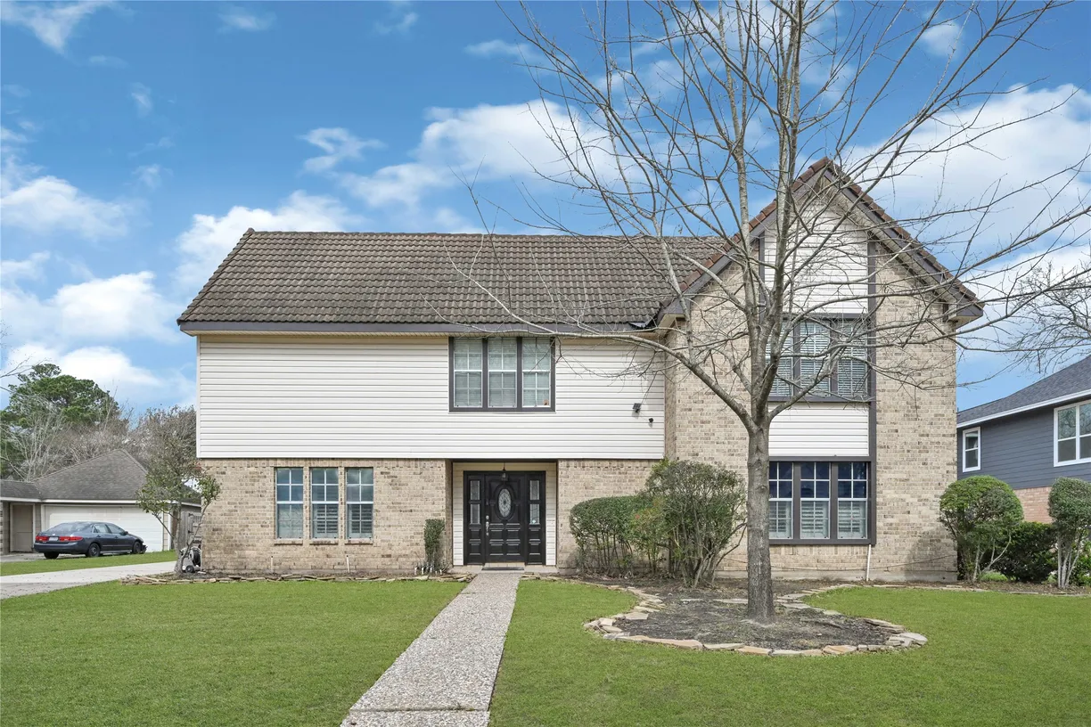 The Woodlands Real Estate | View 3610 Cypresswood Drive | 5 Beds, 2 Baths