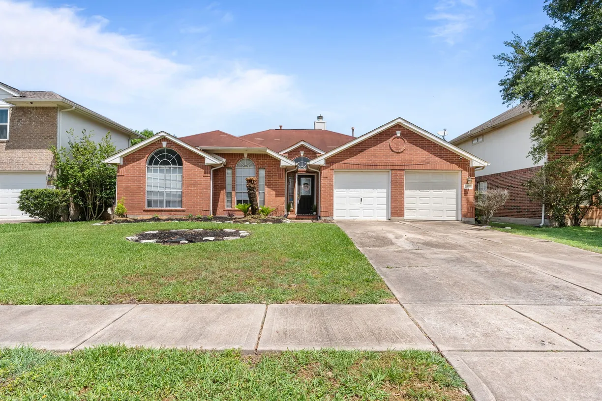 Houston Suburbs Real Estate | View 1522 Hunter Green Lane | 3 Beds, 2 Baths