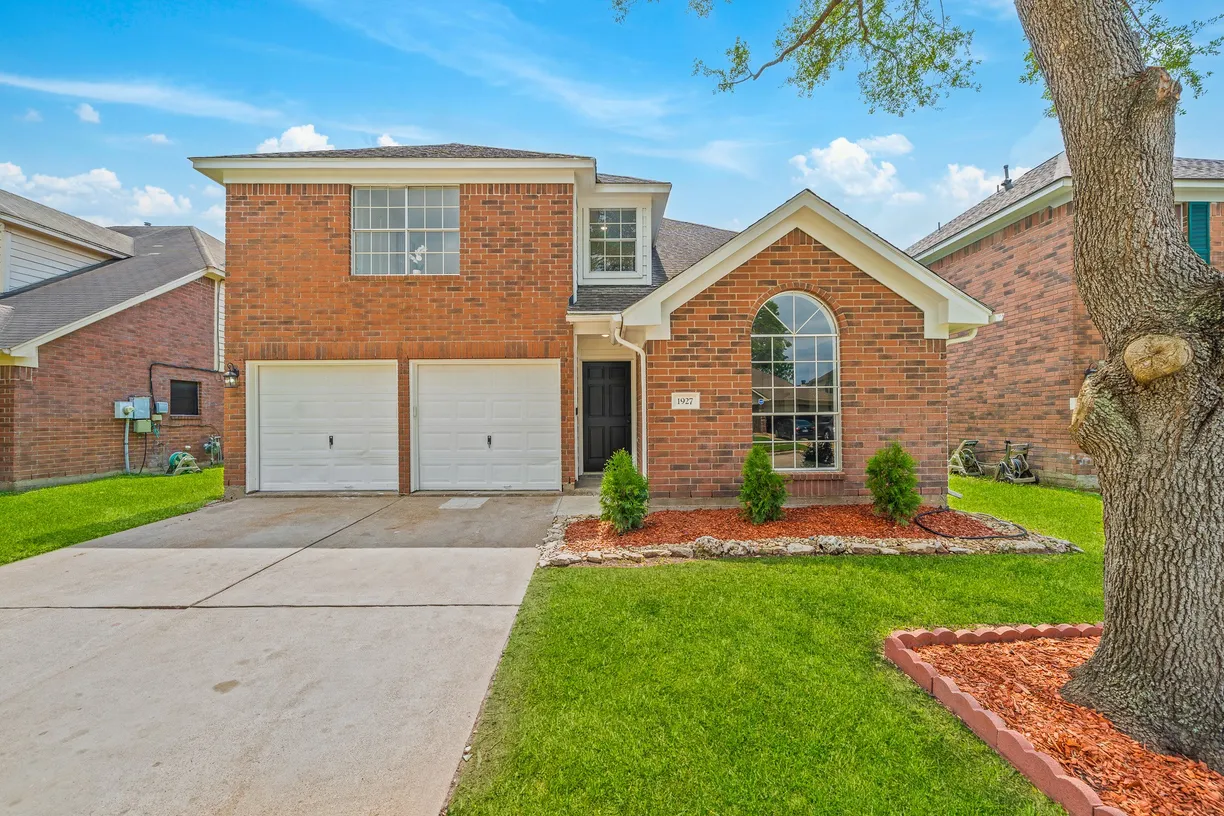 Houston Suburbs Real Estate | View 1927 Village Park Drive | 4 Beds, 2 Baths