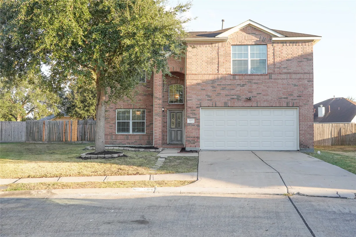 Houston Real Estate | View 102 Village Crest Drive | 4 Beds, 2 Baths