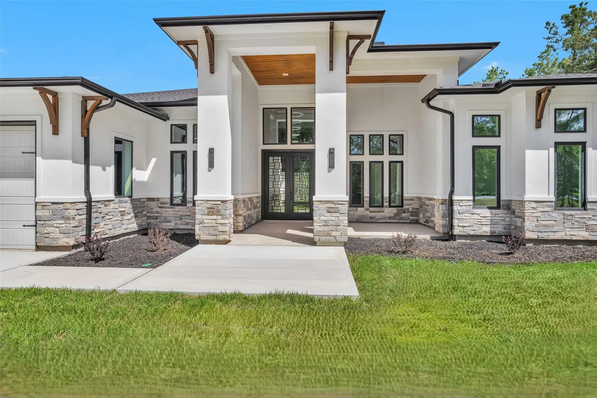 Houston Suburbs Real Estate | View 27900 E Stallion Lane | 6 Beds, 6 Baths