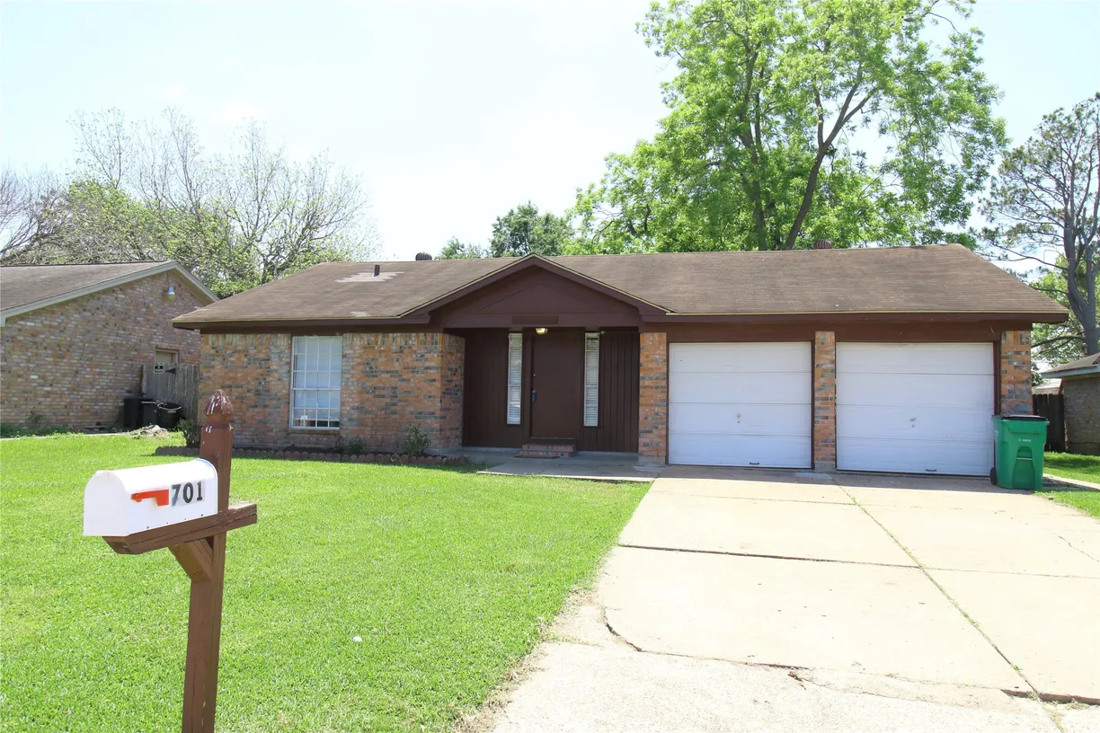 Houston Real Estate | View 701 Meadowglen Drive | 3 Beds, 2 Baths