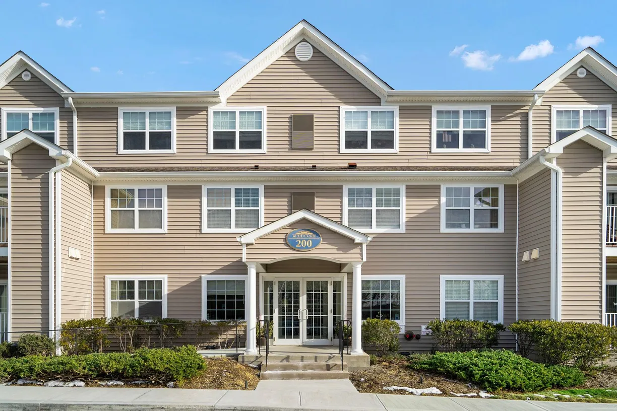 Westchester Real Estate | View 200 Woodcrest Lane, 219 | 2 Beds, 2 Baths