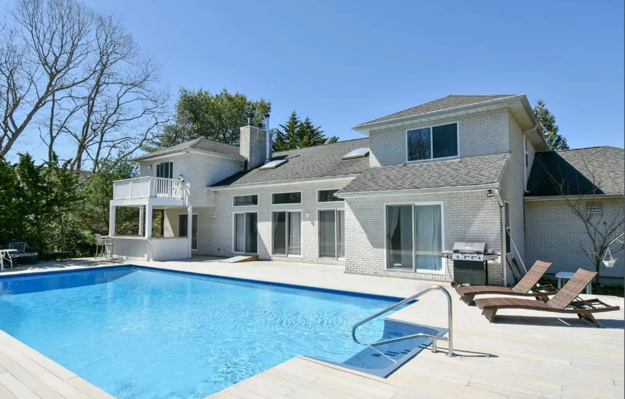 The Hamptons Real Estate | View 24 Wisteria Drive | 6 Beds, 4 Baths