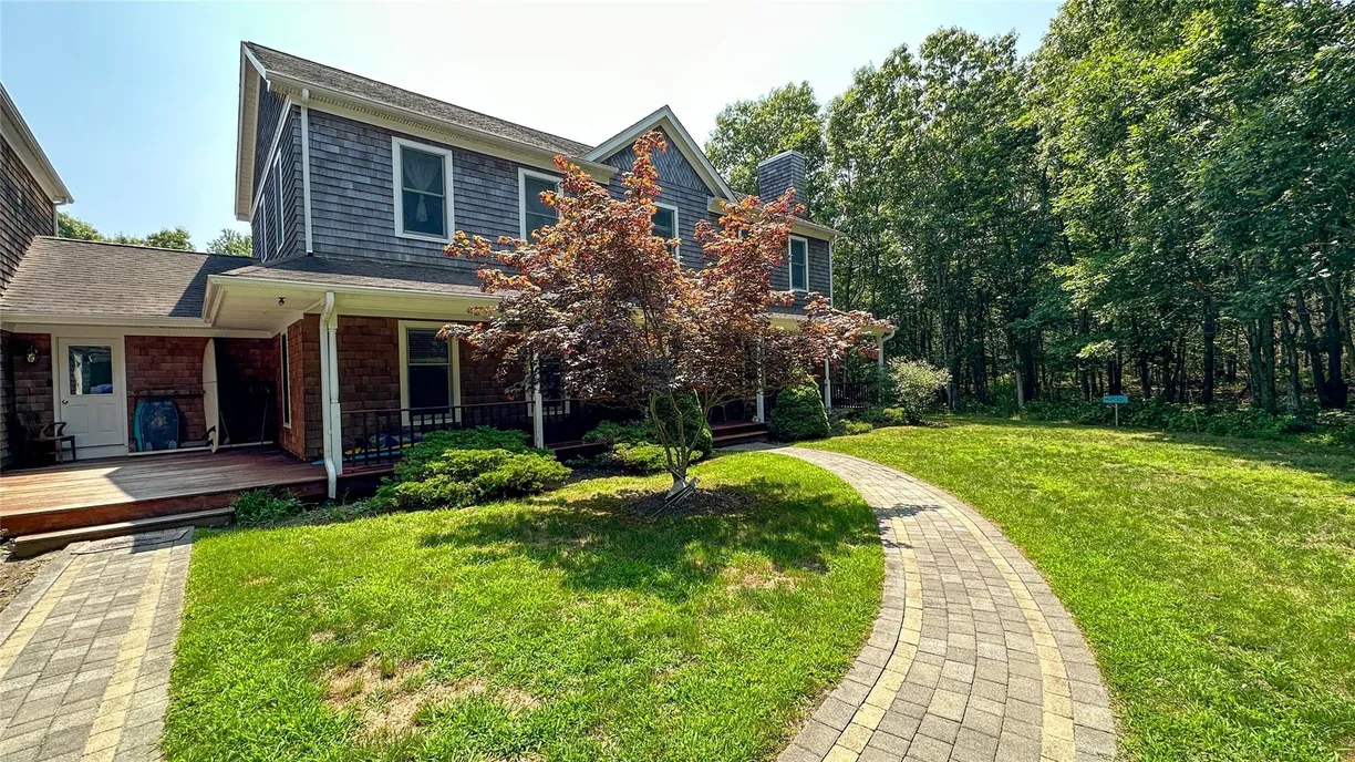 The Hamptons Real Estate | View 18 Mountain Laurel Lane | 4 Beds, 3 Baths