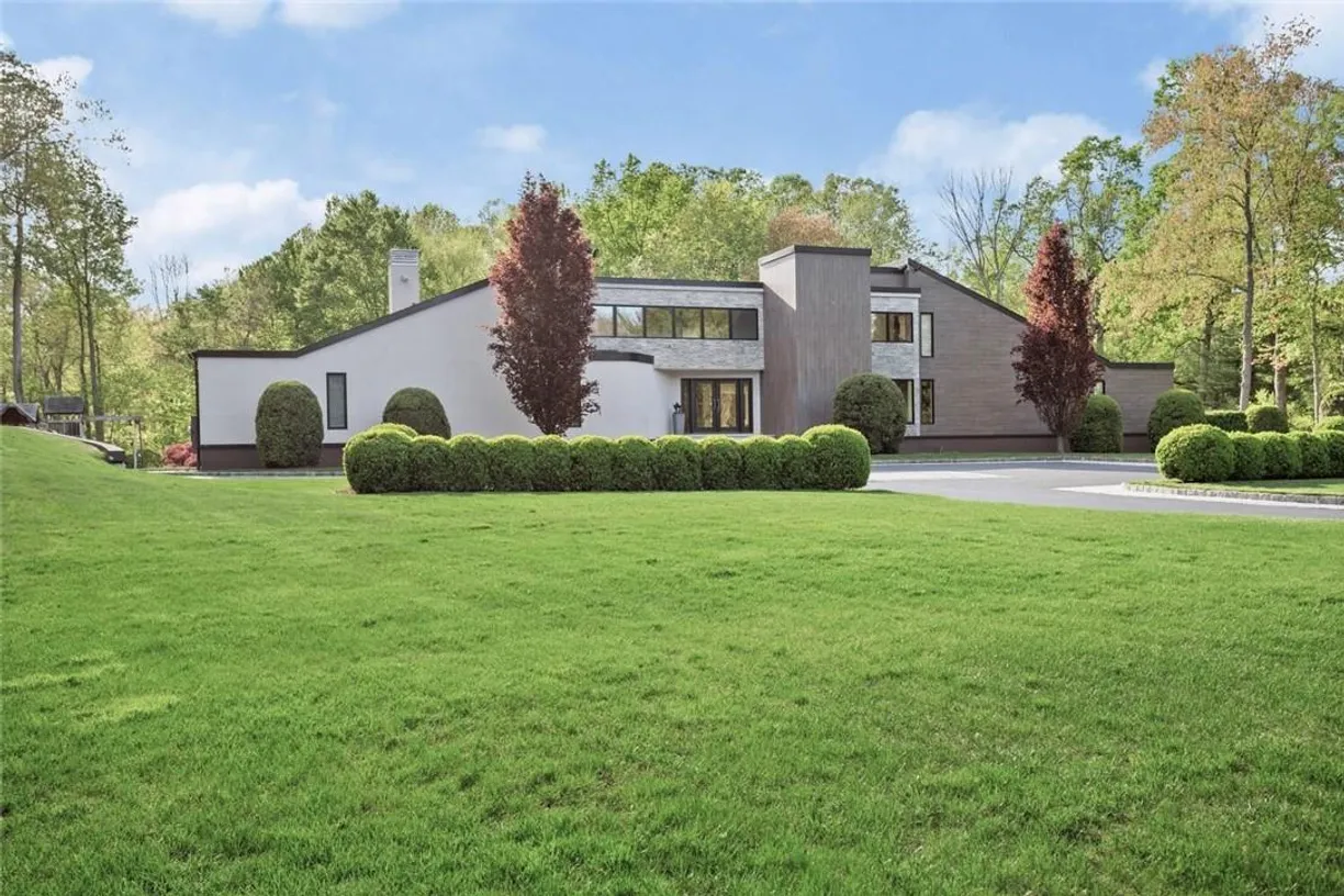 Westchester Real Estate | View 11 Piping Brook Lane | 5 Beds, 3 Baths