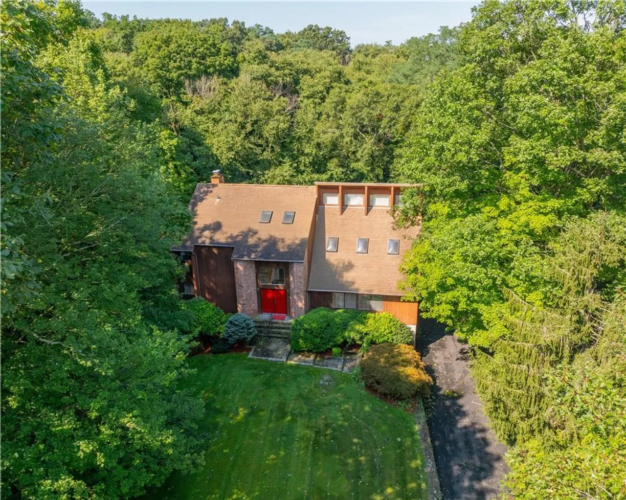 Westchester Real Estate | View 27 Woodland Road | 4 Beds, 3 Baths