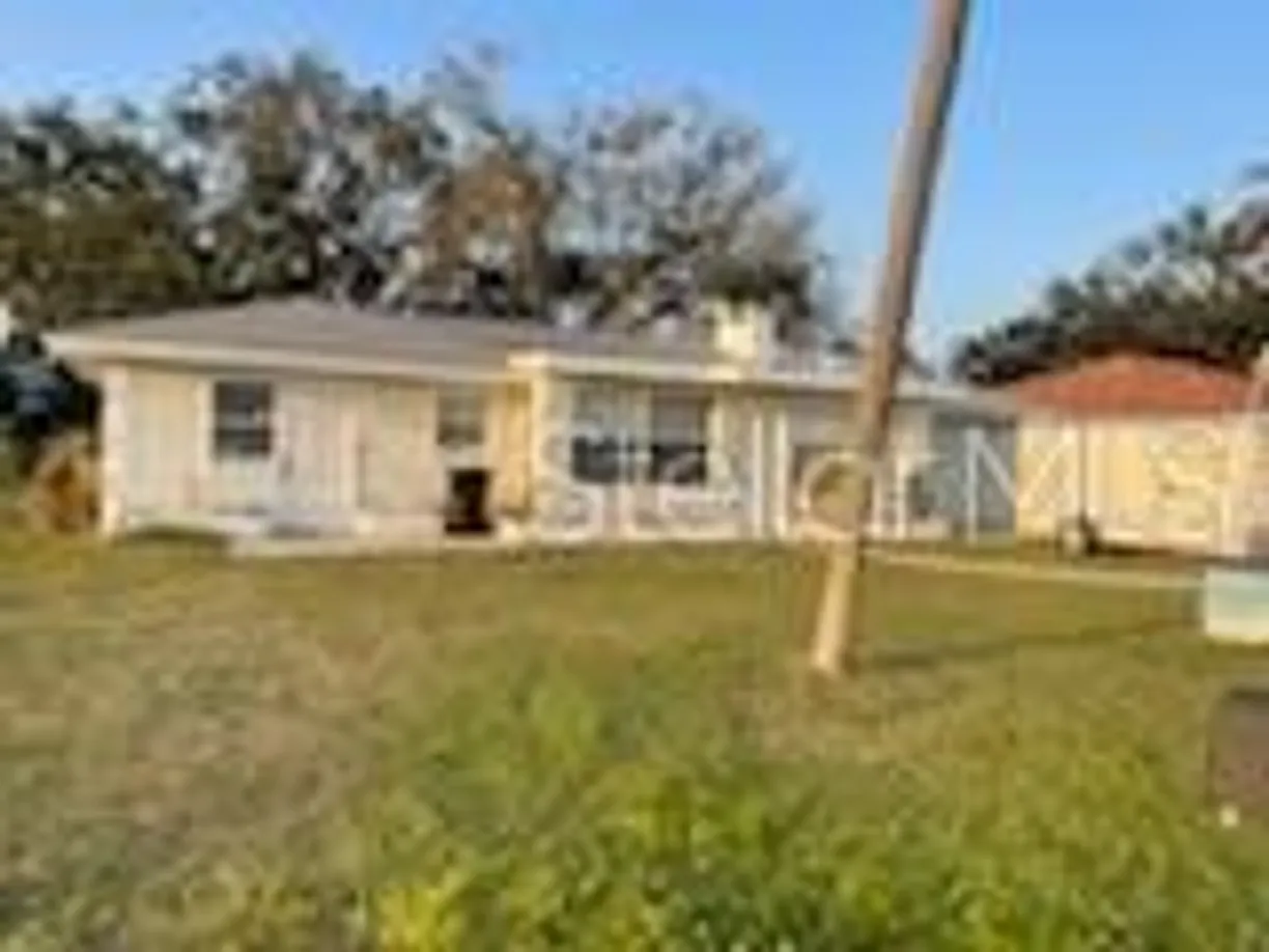 Sarasota/St. Petersburg Real Estate | View 711 A & B PINELAND AVENUE