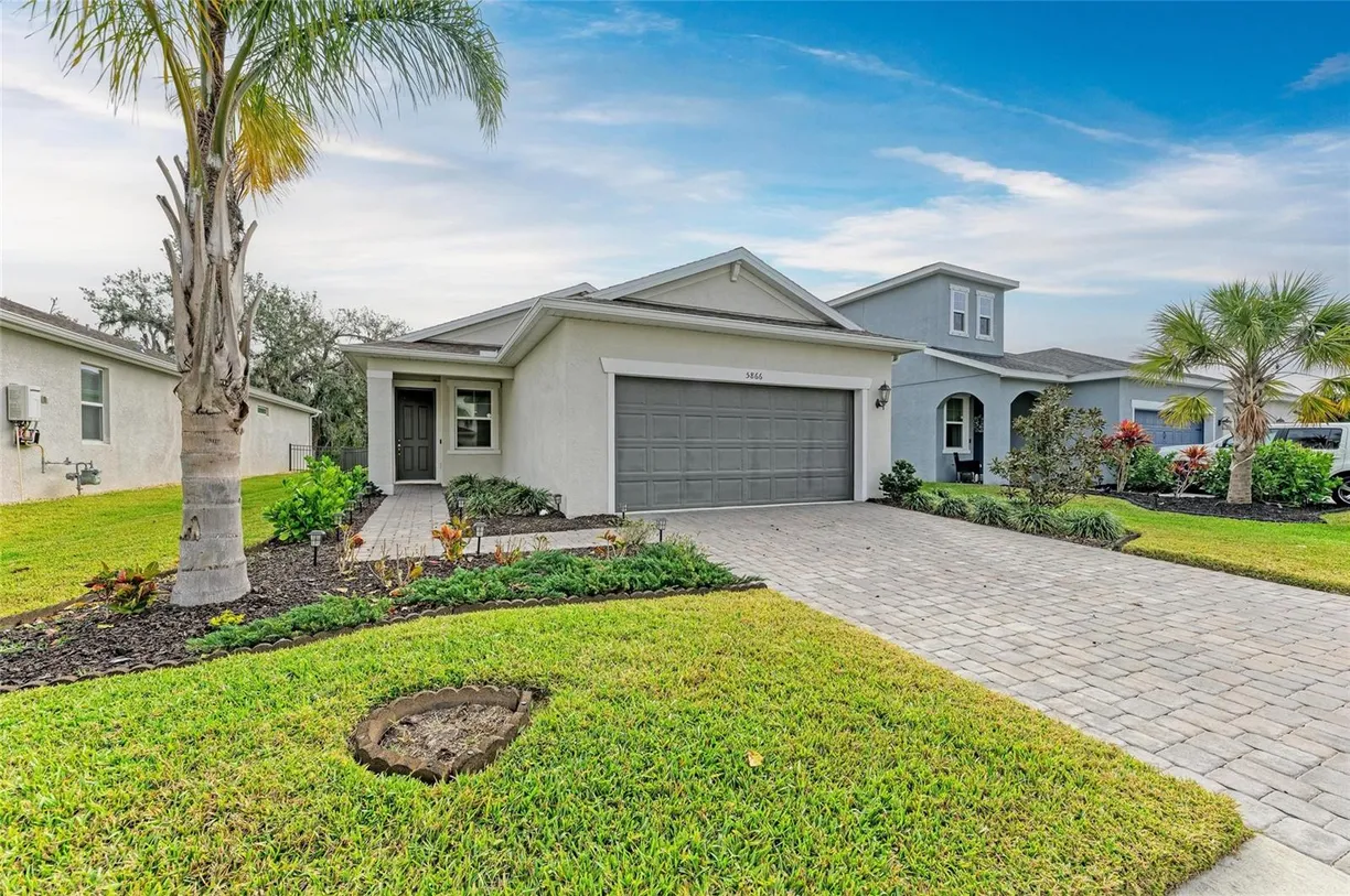 Sarasota/St. Petersburg Real Estate | View 5866 BUNGALOW GROVE COURT | 4 Beds, 2 Baths
