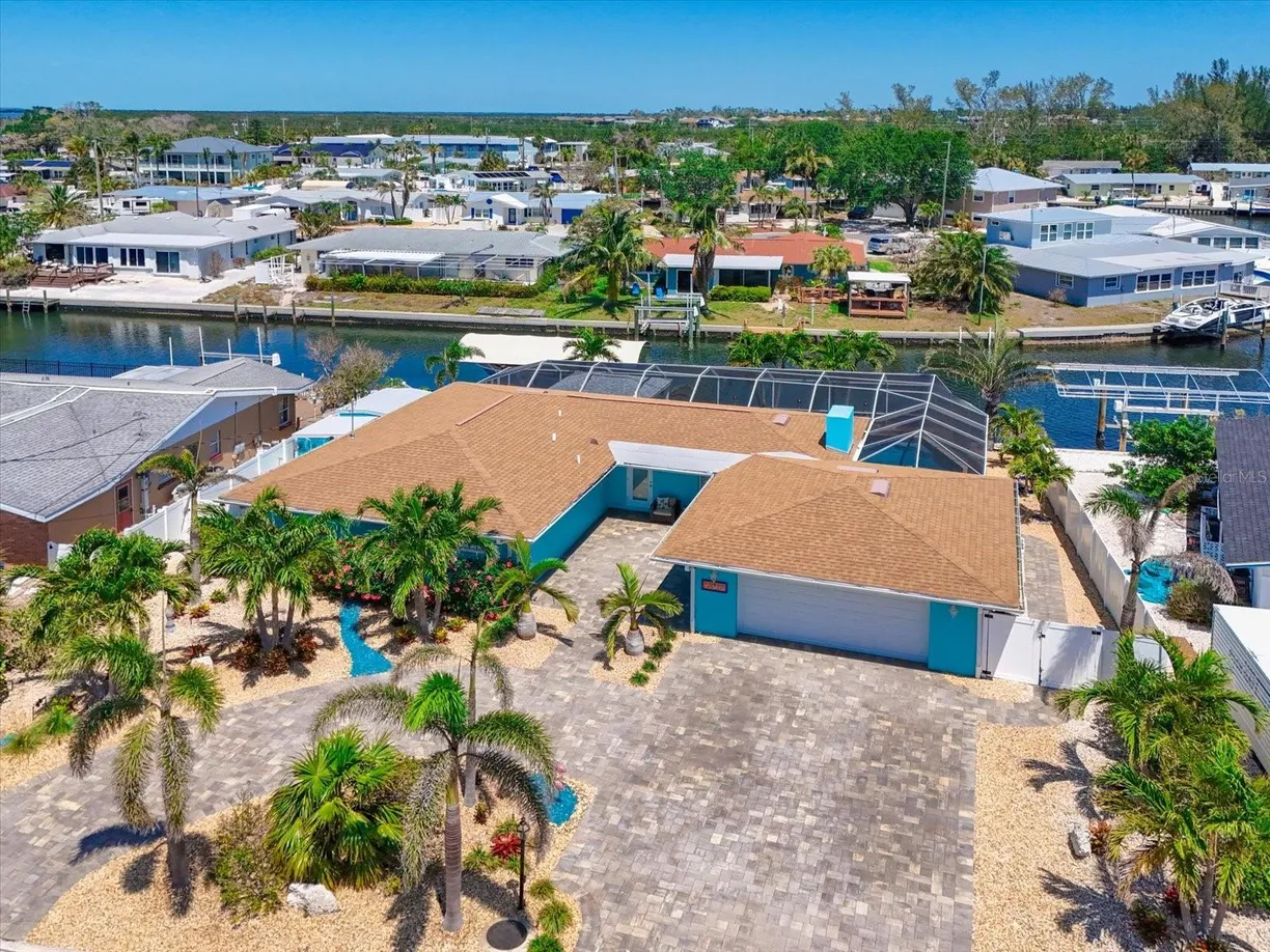 Sarasota/St. Petersburg Real Estate | View 10016 SPOONBILL ROAD | 3 Beds, 2 Baths