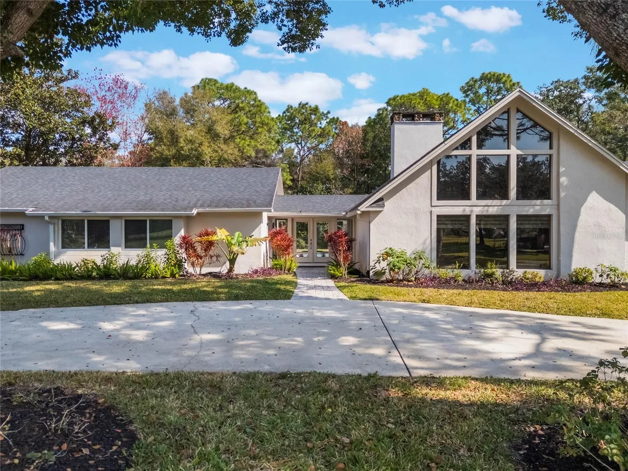 Central Florida Real Estate | View 601 SWEETWATER CLUB BOULEVARD | 4 Beds, 2 Baths