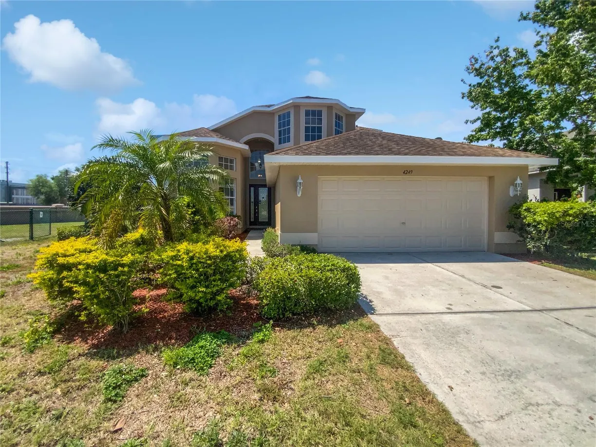 Sarasota/St. Petersburg Real Estate | View 4249 HAWKSLEY PLACE | 4 Beds, 2 Baths