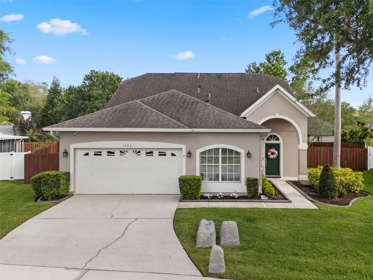 Central Florida Real Estate | View 13214 TRIPHAMMER WAY | 4 Beds, 2 Baths
