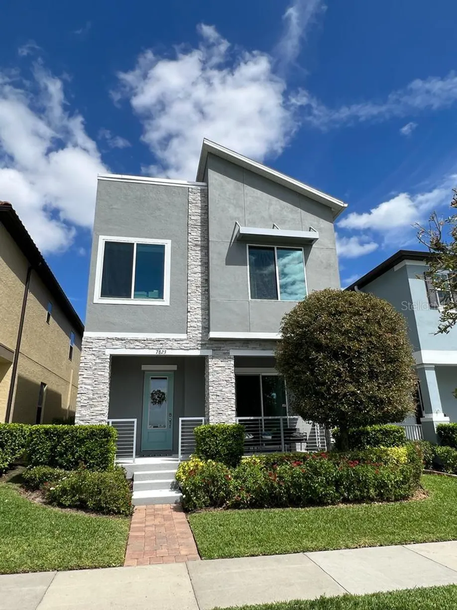 Central Florida Real Estate | View 7823 SUMMERLAKE GROVES STREET | 4 Beds, 2 Baths