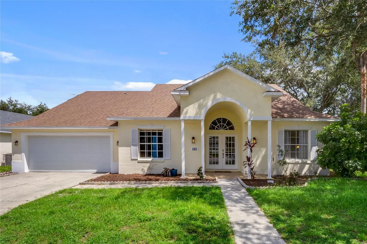 Central Florida Real Estate | View 581 HOLLINGSHEAD LOOP | 4 Beds, 3 Baths