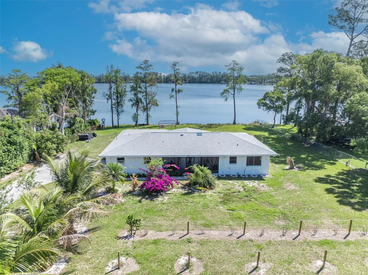 Central Florida Real Estate | View 7420 LAKE WILLIS DRIVE | 3 Beds, 2 Baths