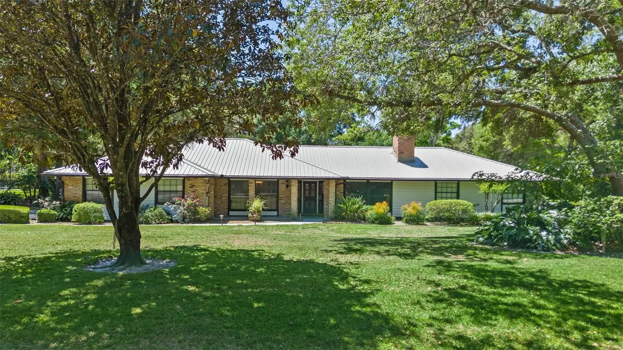 Central Florida Real Estate | View 203 E GREENTREE LANE | 4 Beds, 2 Baths