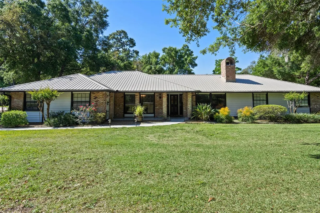 Central Florida Real Estate | View 203 E GREENTREE LANE | Listing