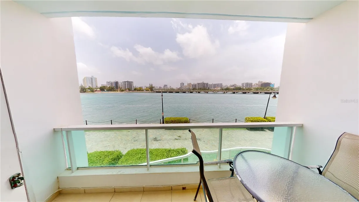 Puerto Rico Real Estate | View 1 Calle Los Rosales CONDADO LAGOON VILLA AT PASEO CARIBE, 217 -218 | 2 Beds, 2 Baths