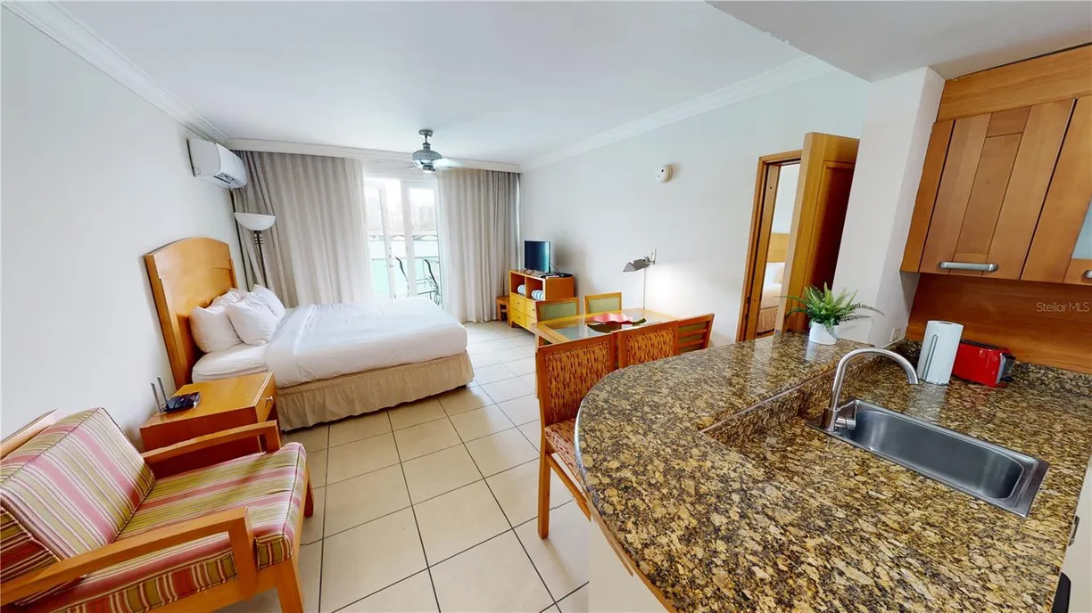 Puerto Rico Real Estate | View 1 Calle Los Rosales CONDADO LAGOON VILLA AT PASEO CARIBE, 217 -218 | Listing