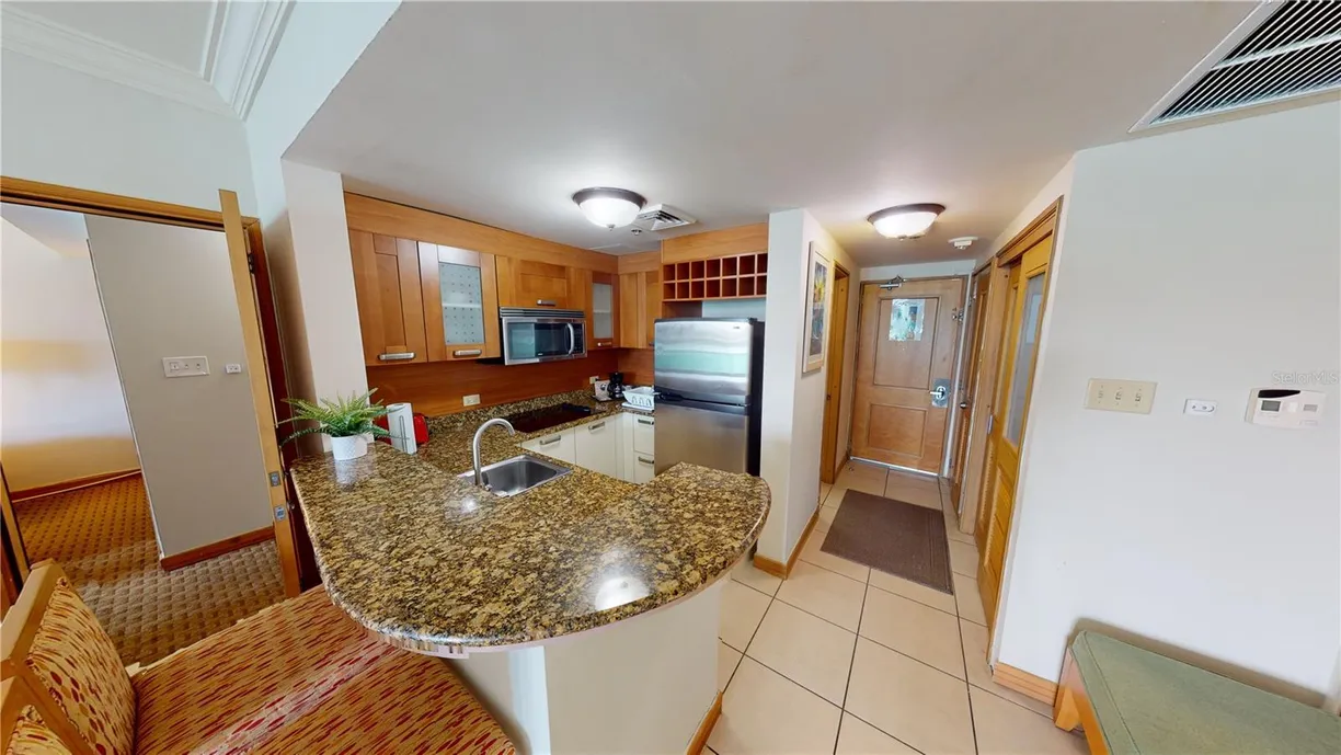 Puerto Rico Real Estate | View 1 Calle Los Rosales CONDADO LAGOON VILLA AT PASEO CARIBE, 217 -218 | Listing