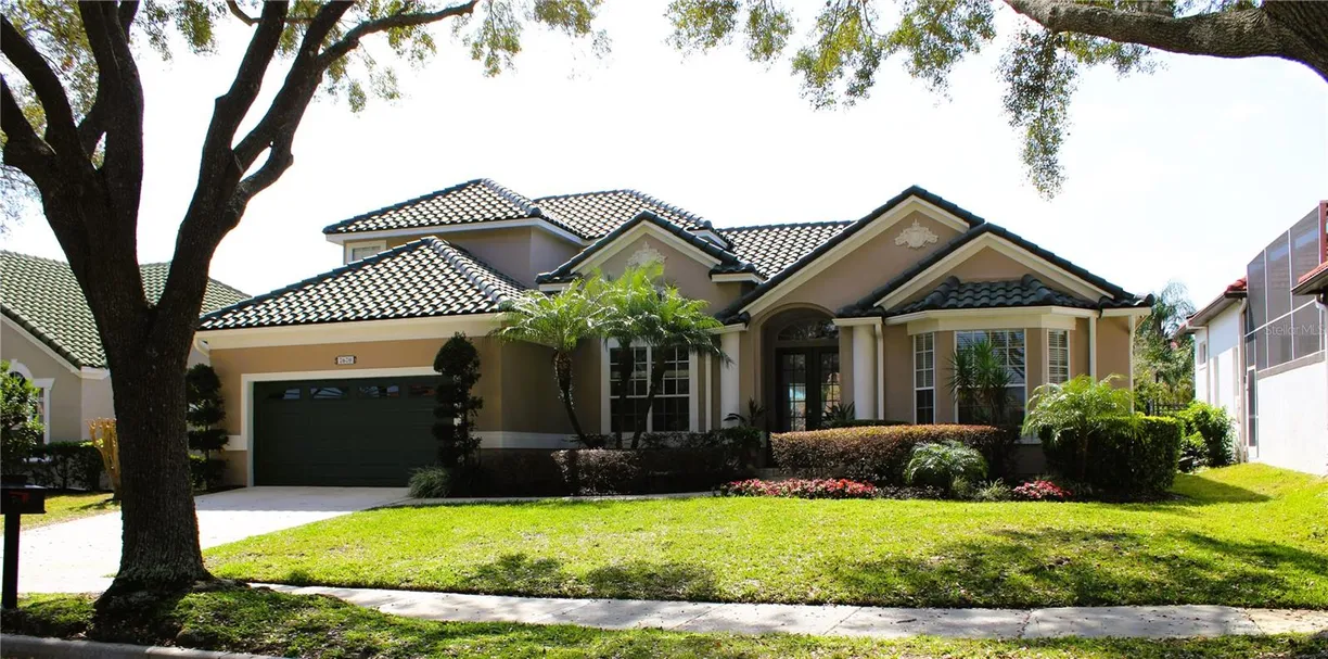 Central Florida Real Estate | View 7670 MILANO DRIVE | 4 Beds, 3 Baths
