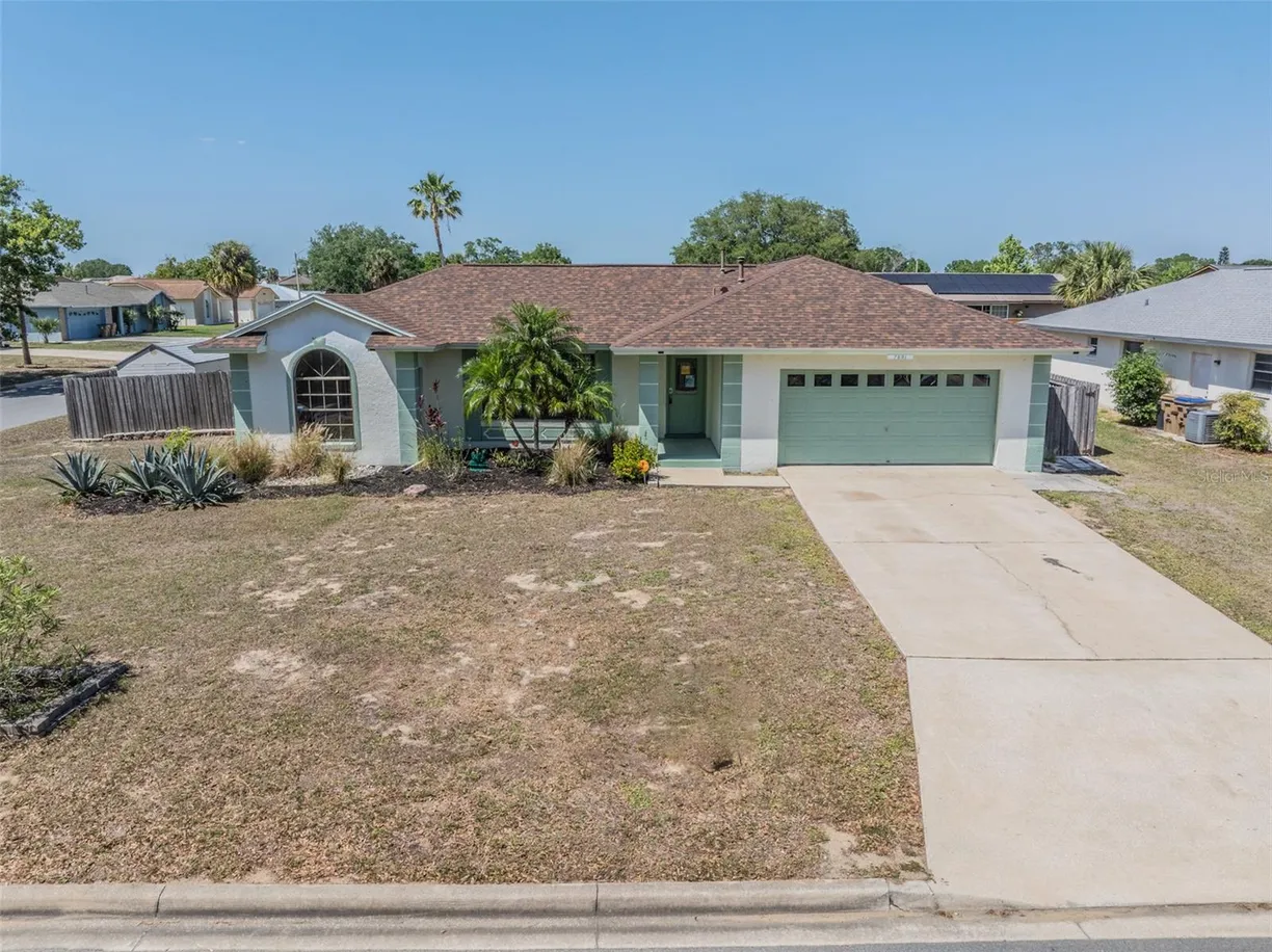 Central Florida Real Estate | View 7691 INDIAN RIDGE TRAIL | 4 Beds, 2 Baths