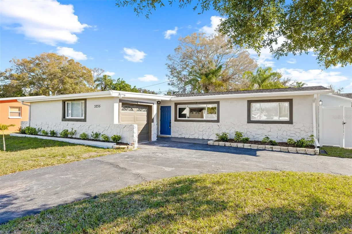 Sarasota/St. Petersburg Real Estate | View 3235 57th St N | 4 Beds, 2 Baths