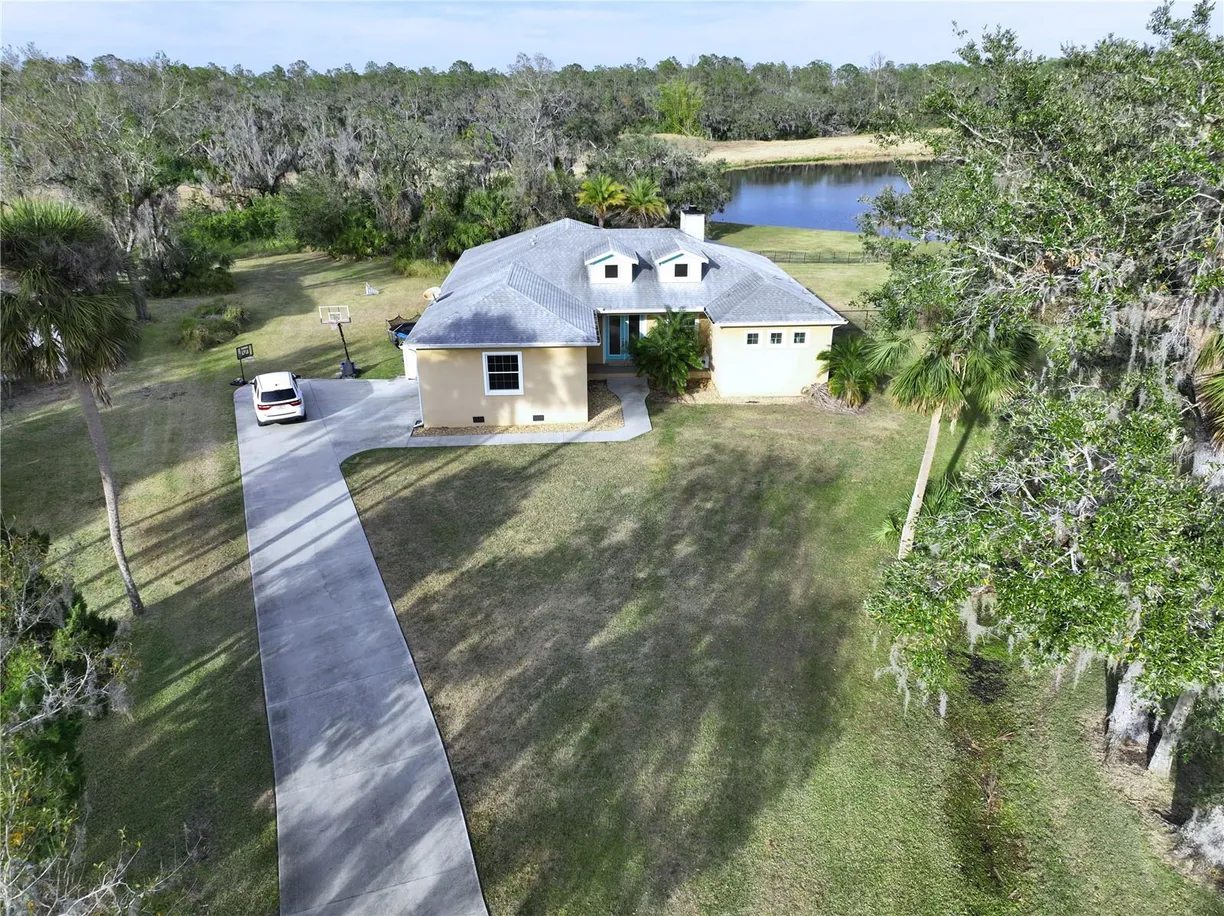 Sarasota/St. Petersburg Real Estate | View 13653 HERITAGE WAY | 4 Beds, 2 Baths