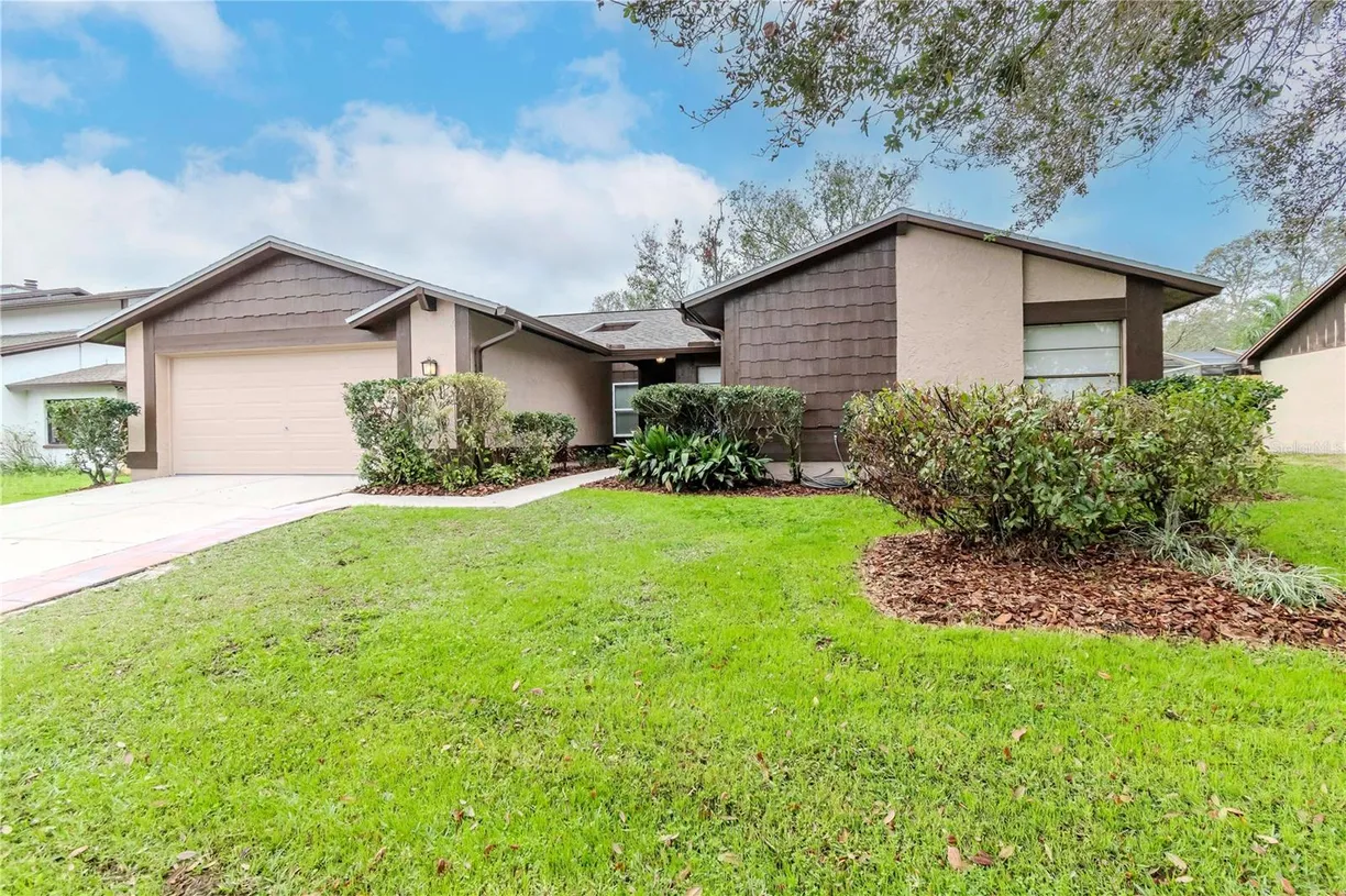 Sarasota/St. Petersburg Real Estate | View 415 BLOOMINGFIELD DRIVE | 4 Beds, 2 Baths